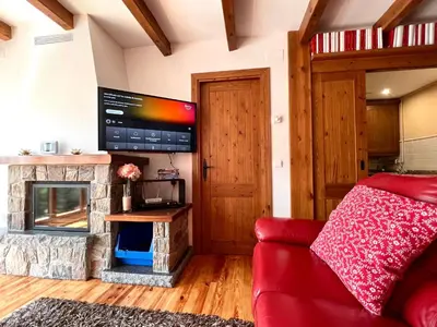 Una televisión o centro de entretenimiento en El Raconet d'Espot - L'Amfitriona