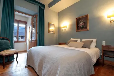 Cama o camas de una habitación en Casa Passeg dera Libertat 8
