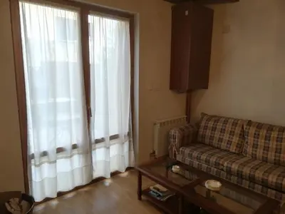 Zona de estar de Pequeño adosado de montaña con terraza