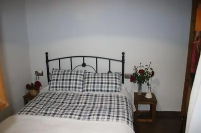 Cama o camas de una habitación en Acogedor estudio en Vilamós, Lleida