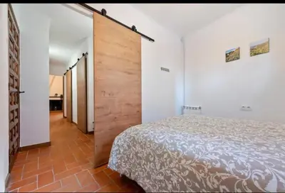 Cama o camas de una habitación en Raconet al cor del Priorat