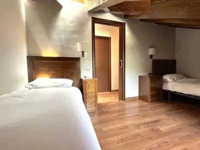 Cama o camas de una habitación en Dúplex amb encant al casc antic d'Esterri i vistes úniques by RURAL D'ÀNEU