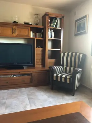 Una televisión o centro de entretenimiento en Casa Candelaria