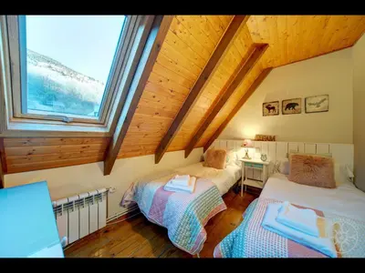 Cama o camas de una habitación en AGLA de Alma de Nieve