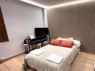 Una televisión o centro de entretenimiento en Apartamentos Baladrias Formigal Centro - Recién Reformado