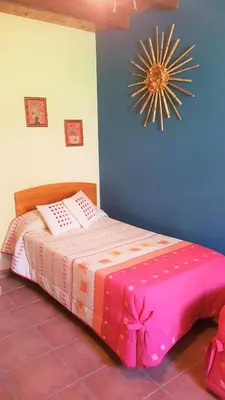 Cama o camas de una habitación en Casa Castel naturaleza y descanso