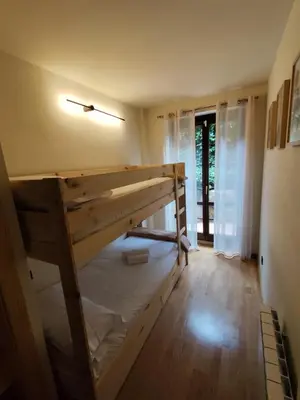 Cama o camas de una habitación en Dúplex en Valencia d'Àneu (Baqueira Beret)