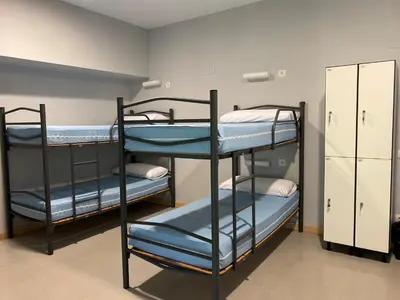 Cama o camas de una habitación en Albergue de Villava