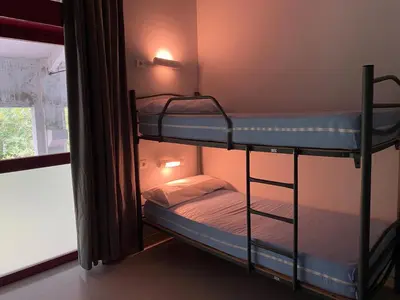 Cama o camas de una habitación en Albergue de Villava