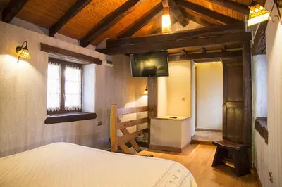 Cama o camas de una habitación en Casa rural Txikirrin Txiki - Selva de Irati
