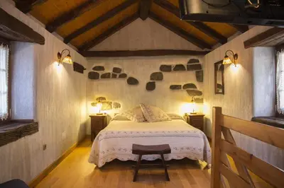 Cama o camas de una habitación en Casa rural Txikirrin Txiki - Selva de Irati
