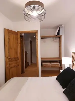 Cama o camas de una habitación en Acogedor dúplex en el Valle de Aran