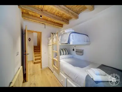 Cama o camas de una habitación en CASA CORILHA de Alma de Nieve