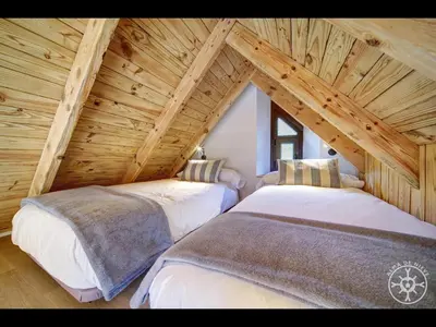 Cama o camas de una habitación en CASA CORILHA de Alma de Nieve