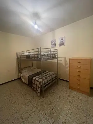 Cama o camas de una habitación en Mas del Llorenç