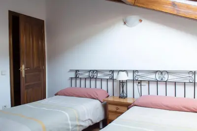 Cama o camas de una habitación en La Caseta de Sastre
