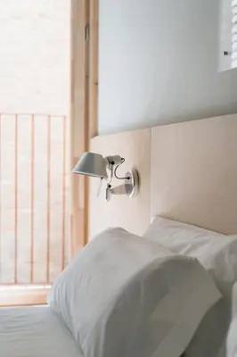 Cama o camas de una habitación en Hotel Santa Ana Tudela