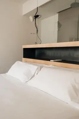 Cama o camas de una habitación en Hotel Santa Ana Tudela