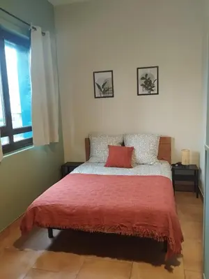 Cama o camas de una habitación en Albergue Kortarixar