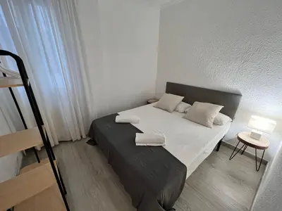 Cama o camas de una habitación en Apartamenticos La Paz I