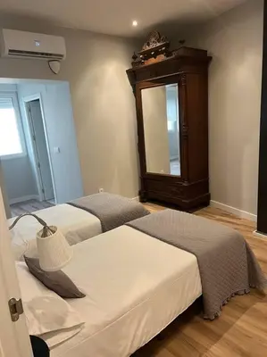 Cama o camas de una habitación en Precioso y céntrico apartamento