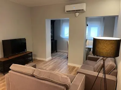 Una televisión o centro de entretenimiento en Precioso y céntrico apartamento