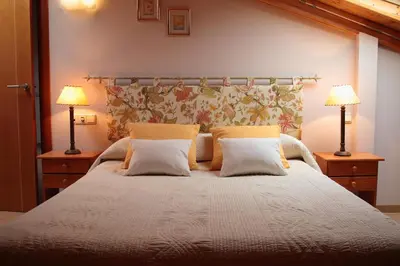 Cama o camas de una habitación en Vivienda Turística Los Mesones