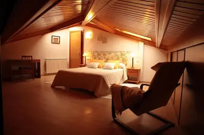Cama o camas de una habitación en Vivienda Turística Los Mesones