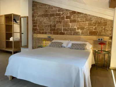 Cama o camas de una habitación en ROS CENTRIC Cal Ros