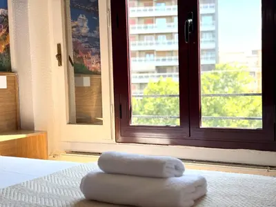 Cama o camas de una habitación en Hostal Zaragoza Centro