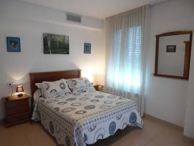 Cama o camas de una habitación en Apartamentos Edificio Aguilas