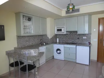 Una cocina o zona de cocina en Apartamentos Edificio Aguilas
