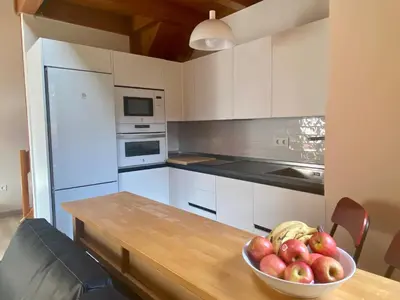 Una cocina o zona de cocina en Duplex Kasares en Sesué No VU HUESCA24037