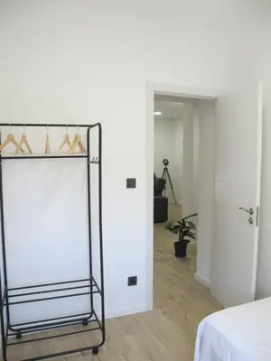 Cama o camas de una habitación en Apartamento grande en Huesca