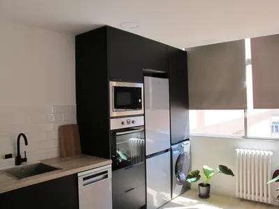 Una cocina o zona de cocina en Apartamento grande en Huesca