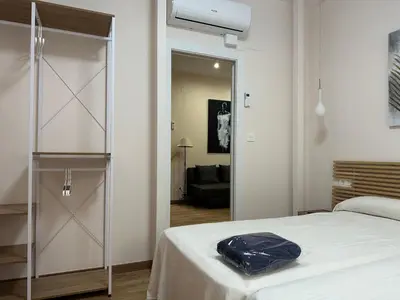 Cama o camas de una habitación en Dos Torres Tenor Gayarre - Encanto con Balcón Interior
