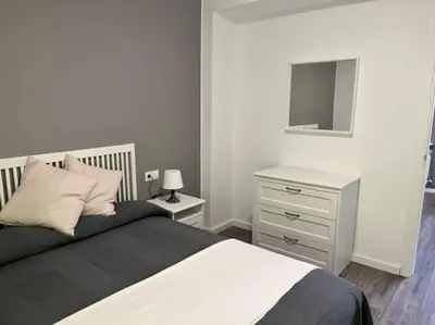 Cama o camas de una habitación en La Posada de Luismi