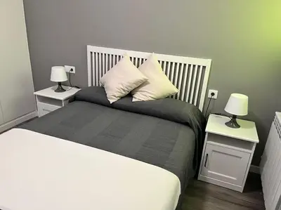 Cama o camas de una habitación en La Posada de Luismi