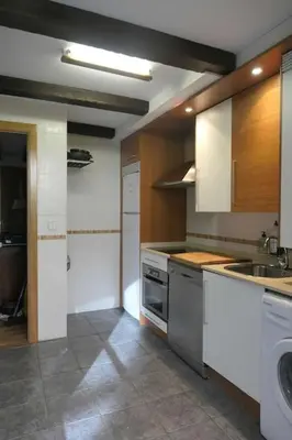 Una cocina o zona de cocina en Piso Acogedor de Montaña con Terraza