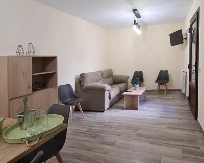 Zona de estar de Apartamentos La Era de Pasé
