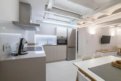 Una cocina o zona de cocina en VALERIA-DREAMS Loscos 3º