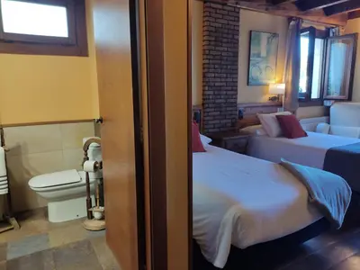 Cama o camas de una habitación en Hotel Rural Irati selva de Irati