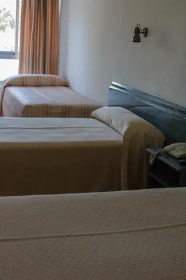 Cama o camas de una habitación en Hotel Pepa