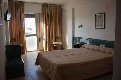 Cama o camas de una habitación en Hotel Pepa