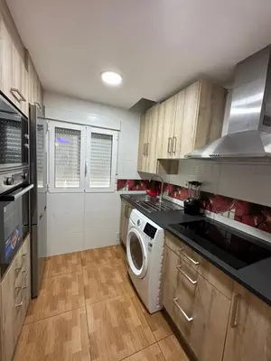Una cocina o zona de cocina en Apartamento Zaragoza Picarral