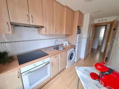 Una cocina o zona de cocina en Los Pinos, acogedor apartamento con garaje - Arafita Apartamentos