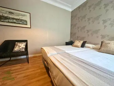 Cama o camas de una habitación en Dos Torres Valinor - Plaza del Pilar