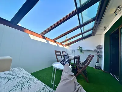 Zona de estar de Dos Torres Ático - Solárium Privado en Calle Alfonso I