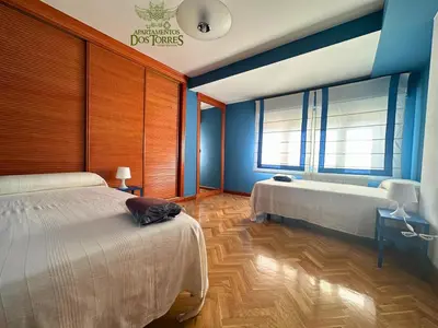 Cama o camas de una habitación en Dos Torres Ático - Solárium Privado en Calle Alfonso I