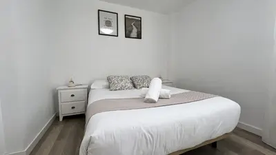 Cama o camas de una habitación en Apartamenticos Plaza del Pilar III